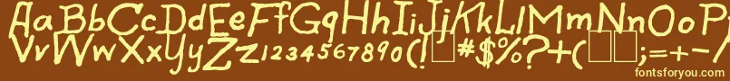 SpookySpiders Font – Yellow Fonts on Brown Background