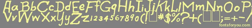 SpookySpiders Font – Yellow Fonts on Gray Background