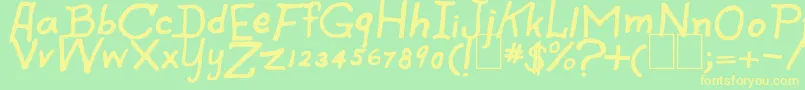 SpookySpiders-fontti – keltaiset fontit vihreällä taustalla