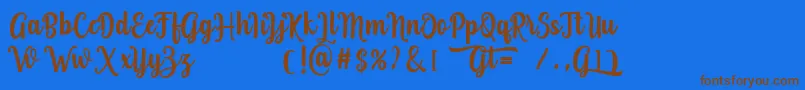 Grafiteg free Font – Brown Fonts on Blue Background