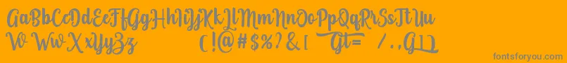 Grafiteg free-Schriftart – Graue Schriften auf orangefarbenem Hintergrund