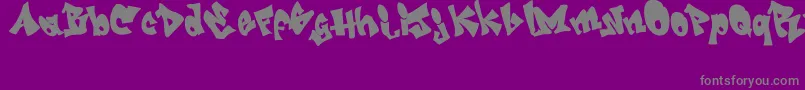GRAFITI   jedagraphicx-fontti – harmaat kirjasimet violetilla taustalla