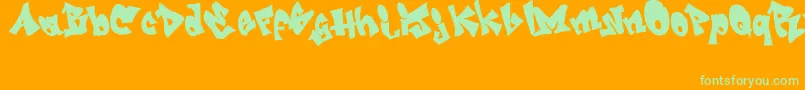 Шрифт GRAFITI   jedagraphicx – зелёные шрифты на оранжевом фоне