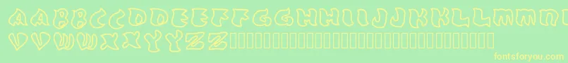 Grafooutline Regular Font – Yellow Fonts on Green Background