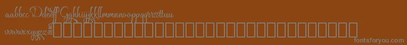 Grafyk Demo-Schriftart – Graue Schriften auf braunem Hintergrund