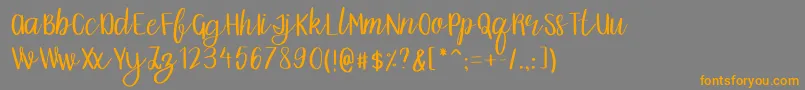 Grainne Font – Orange Fonts on Gray Background