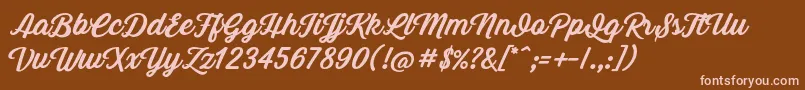 Grand Aventure Font – Pink Fonts on Brown Background