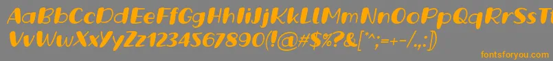 Czcionka Grande October Three Italic Font by Situjuh 7NTypes – pomarańczowe czcionki na szarym tle