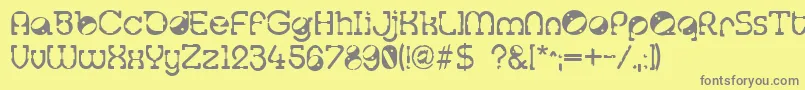 フォントTralfam – 黄色の背景に灰色の文字