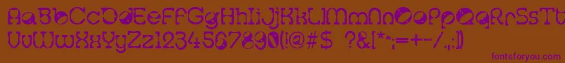 Tralfam Font – Purple Fonts on Brown Background