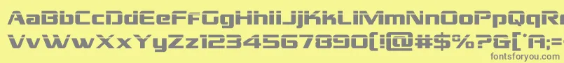 フォントgrandnationallaser – 黄色の背景に灰色の文字