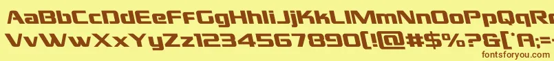 フォントgrandnationalleft – 茶色の文字が黄色の背景にあります。