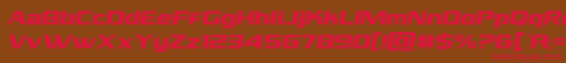 フォントgrandnationalsemital – 赤い文字が茶色の背景にあります。