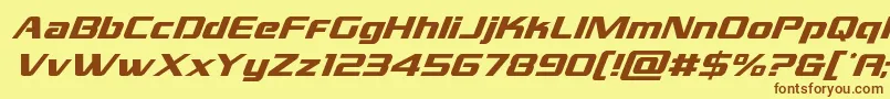 フォントgrandnationalsuperital – 茶色の文字が黄色の背景にあります。