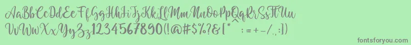 Granotta Regular Font – Gray Fonts on Green Background