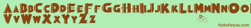 Grauman-fontti – ruskeat fontit vihreällä taustalla