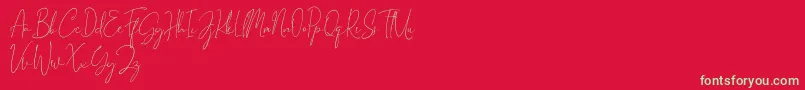 Gravity Handwritten Font – Green Fonts on Red Background