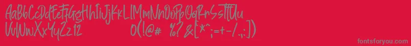 Great Authorized-Schriftart – Graue Schriften auf rotem Hintergrund