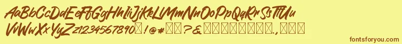 GreattongBrush Font – Brown Fonts on Yellow Background