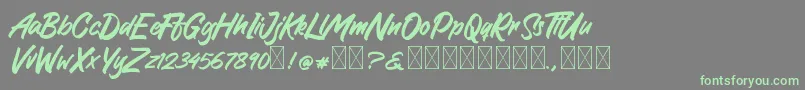 GreattongBrush Font – Green Fonts on Gray Background