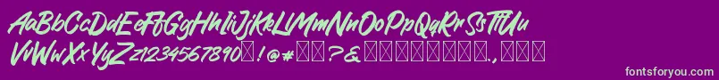 GreattongBrush Font – Green Fonts on Purple Background