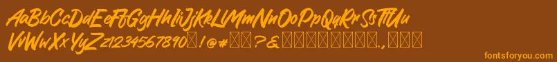 GreattongBrush Font – Orange Fonts on Brown Background