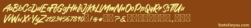 GreattongBrush Font – Yellow Fonts on Brown Background