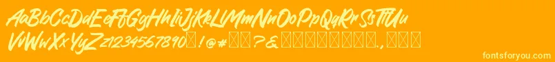 GreattongBrush Font – Yellow Fonts on Orange Background
