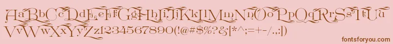 Шрифт GreatVictorian Swashed – коричневые шрифты на розовом фоне