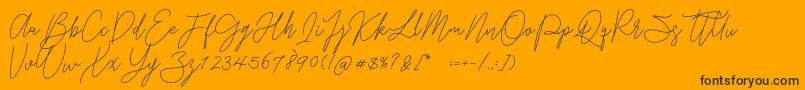 Czcionka Gredom Monoline – czarne czcionki na pomarańczowym tle