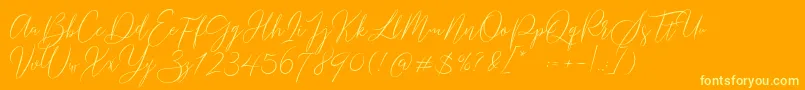 Gredom-Schriftart – Gelbe Schriften auf orangefarbenem Hintergrund