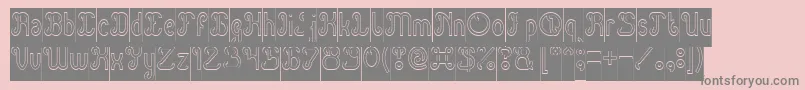 Green Avocado Hollow Inverse-Schriftart – Graue Schriften auf rosa Hintergrund