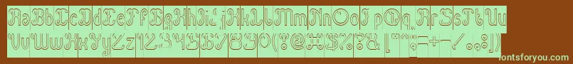 フォントGreen Avocado Hollow Inverse – 緑色の文字が茶色の背景にあります。