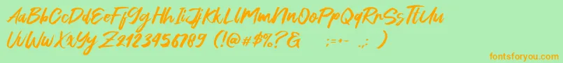 フォントGreen Fonte – オレンジの文字が緑の背景にあります。