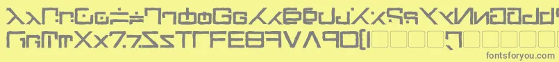 Green Martian Distressed Bold-fontti – harmaat kirjasimet keltaisella taustalla