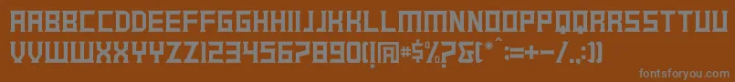 GREENLAND-fontti – harmaat kirjasimet ruskealla taustalla