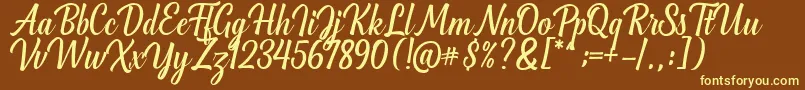 Greenlight Script Font – Yellow Fonts on Brown Background