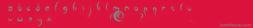 Greenman-Schriftart – Graue Schriften auf rotem Hintergrund