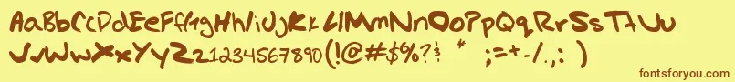 Gregs hand Font – Brown Fonts on Yellow Background
