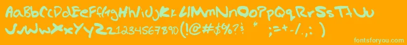 Gregs hand Font – Green Fonts on Orange Background