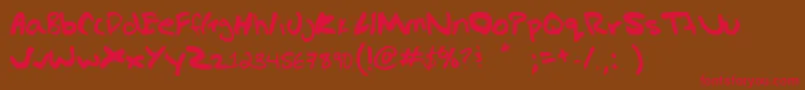 Gregs hand Font – Red Fonts on Brown Background