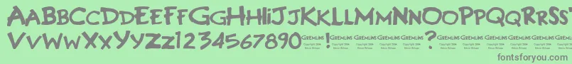 フォントGREMLINS – 緑の背景に灰色の文字