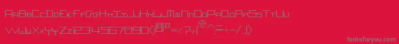 HozenozzleThin-Schriftart – Graue Schriften auf rotem Hintergrund