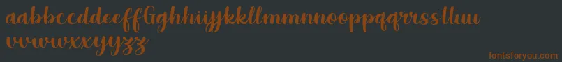 Шрифт Grestal Script Demo – коричневые шрифты на чёрном фоне