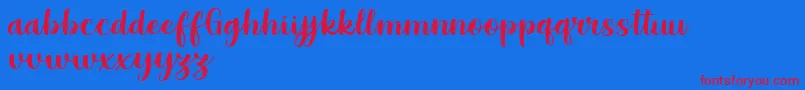 Grestal Script Demo-Schriftart – Rote Schriften auf blauem Hintergrund