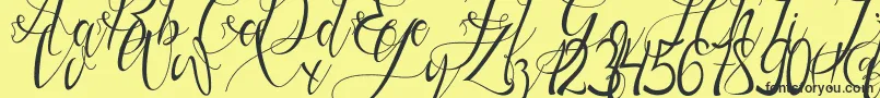 Gresthine Font – Black Fonts on Yellow Background
