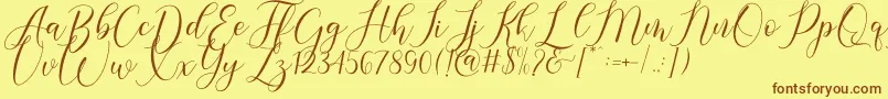 Gresya-Schriftart – Braune Schriften auf gelbem Hintergrund