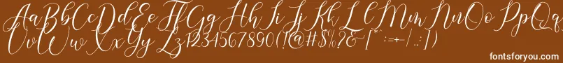 Gresya-Schriftart – Weiße Schriften auf braunem Hintergrund