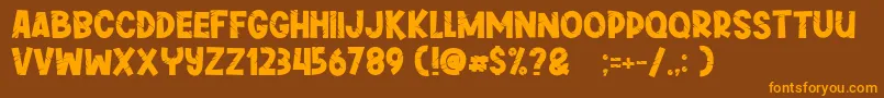 Greywall-Schriftart – Orangefarbene Schriften auf braunem Hintergrund