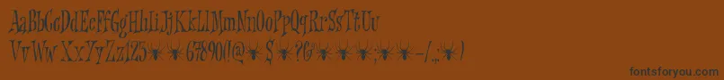 Griezelig DEMO Font – Black Fonts on Brown Background